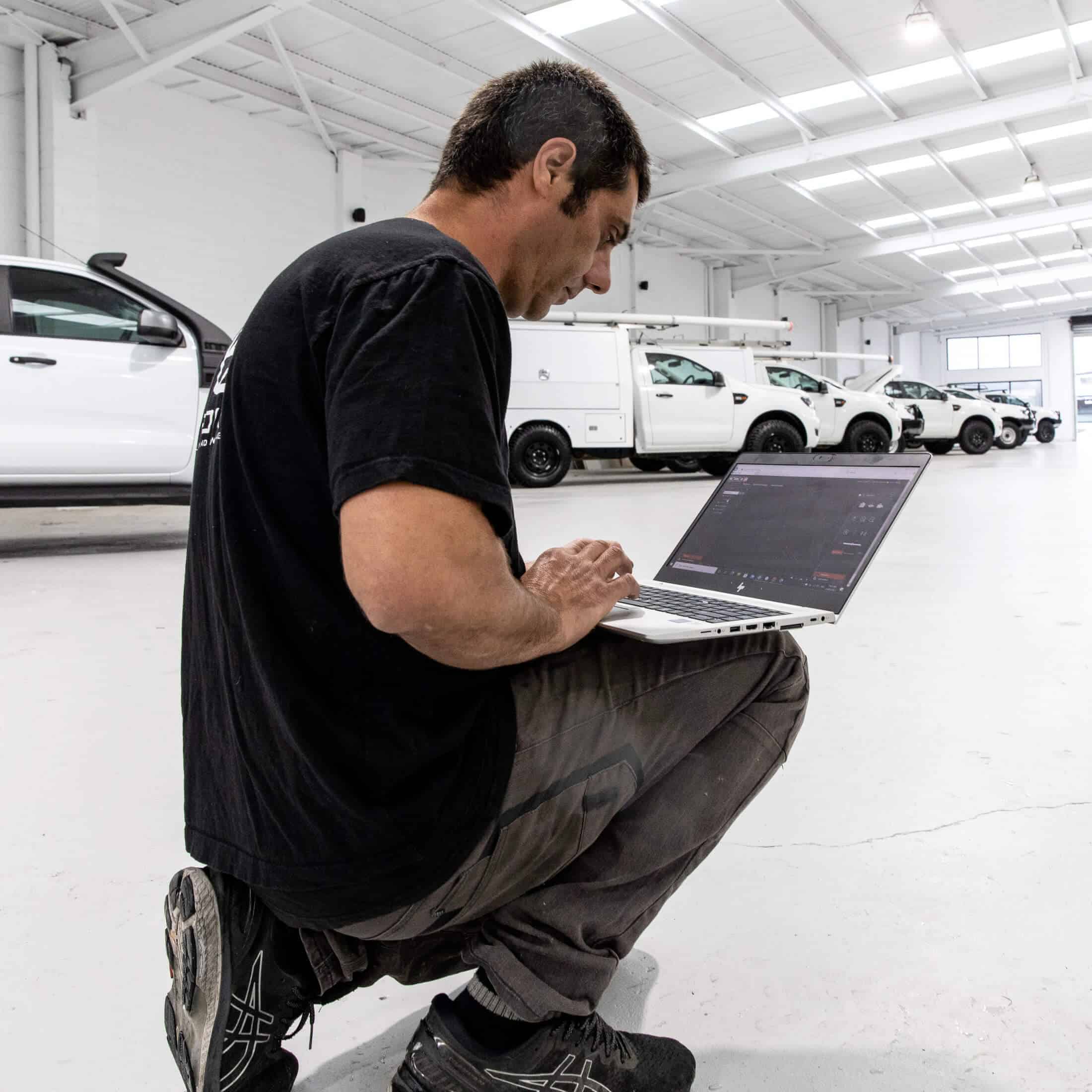 Man typing on the laptop