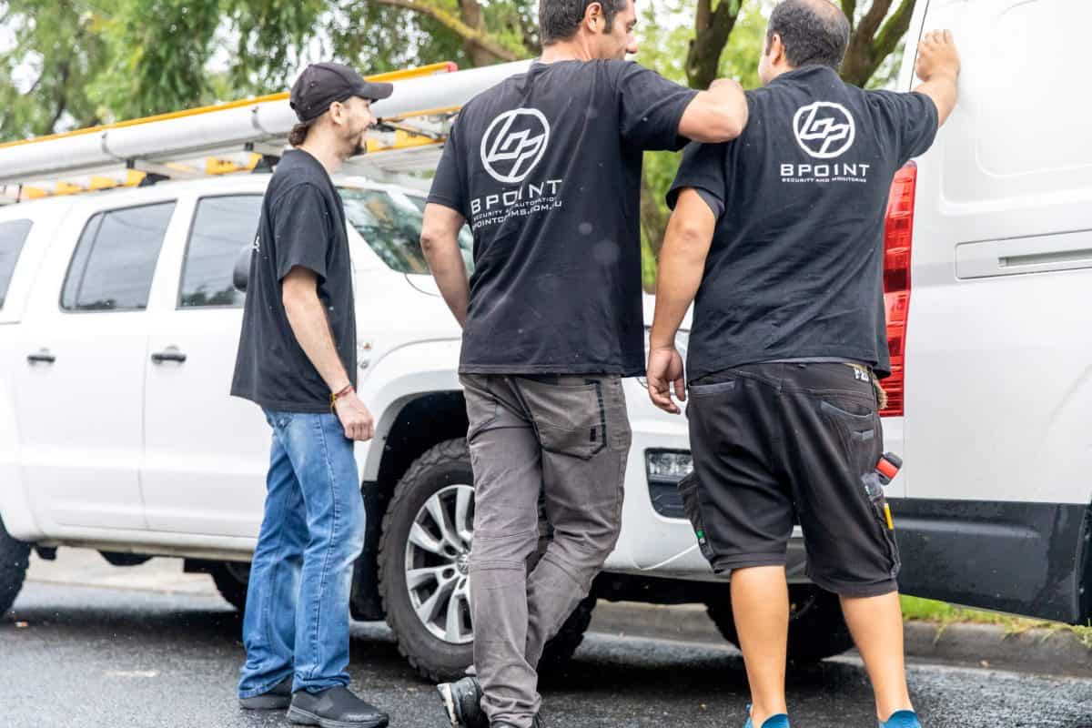 Bpoint technicians preparing equipment at a service vehicle