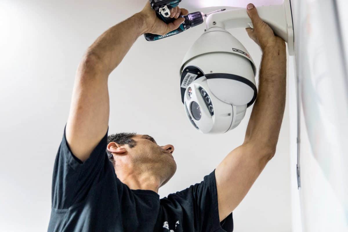 Bpoint technician mounting a PTZ camera