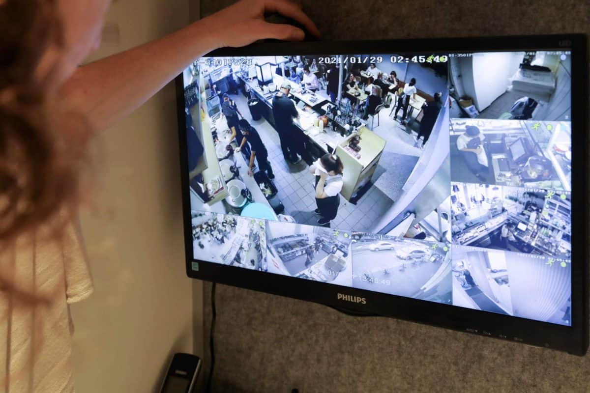 Recorded footage reviewed on a monitor at a commercial site